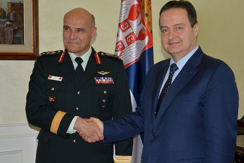 Кристијан Жунo и Ивица Дачић